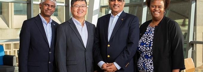 Members of the AI Institute for Exceptional Education team. From left: Ranga Setlur, Jinjun Xiong, Venu Govindaraju and Letitia Thomas. Photo: Douglas Levere. 