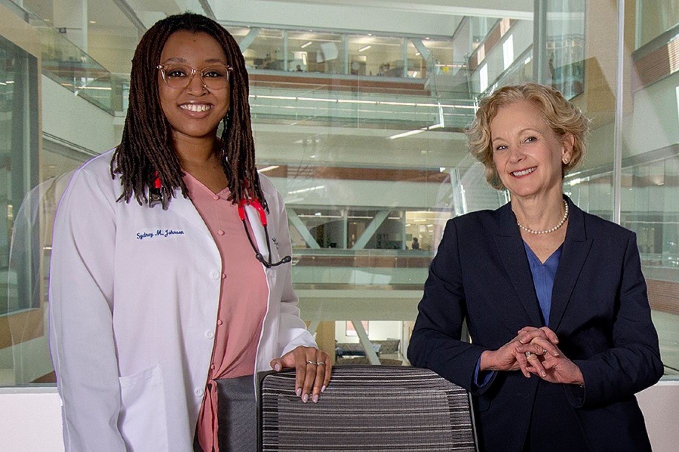 Zoom image: Sydney Johnson with Jacobs School Dean Allison Brashear, photographed during the spring 2022 semester. Photo: Sandra Kicman 