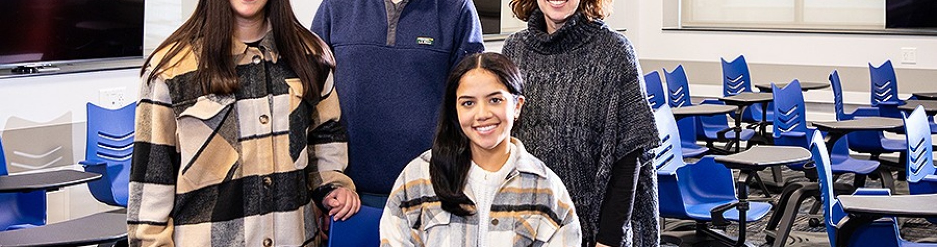 From left, Sarah Moreno, Health service administration MPH program; Brandon Kuhn, project administrator; Leslie Mendoza, advanced graduate certificate in public health (seated); Kimberly Krytus. 