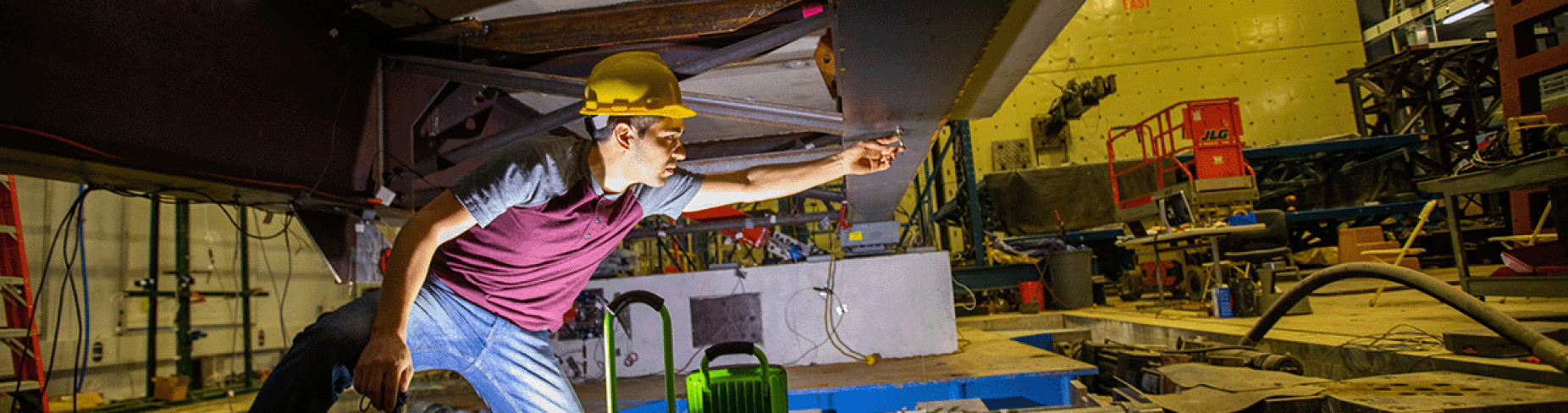 A researcher works inside UB's Structural Engineering and Earthquake Simulation Laboratory. 
