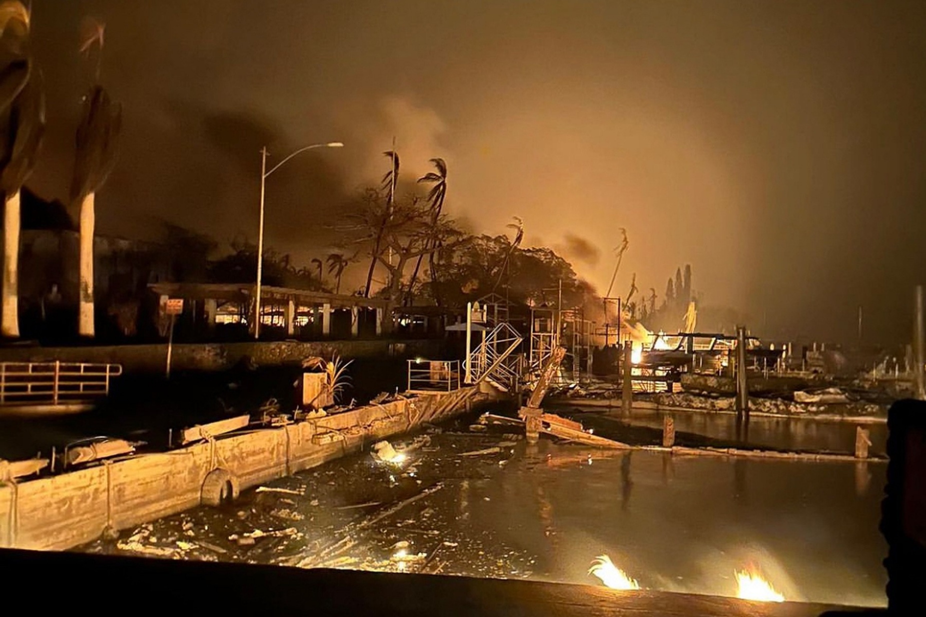 Damage in the harbor of Lahaina on the island of Maui following a devastating wildfire, via the U.S. Coast Guard. 