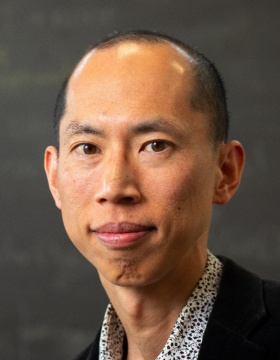 Naoki Masuda, with the department of mathematics, poses for a portrait in a common study space in the Mathematics Building in February 2024. Photographer: Meredith Forrest Kulwicki. 