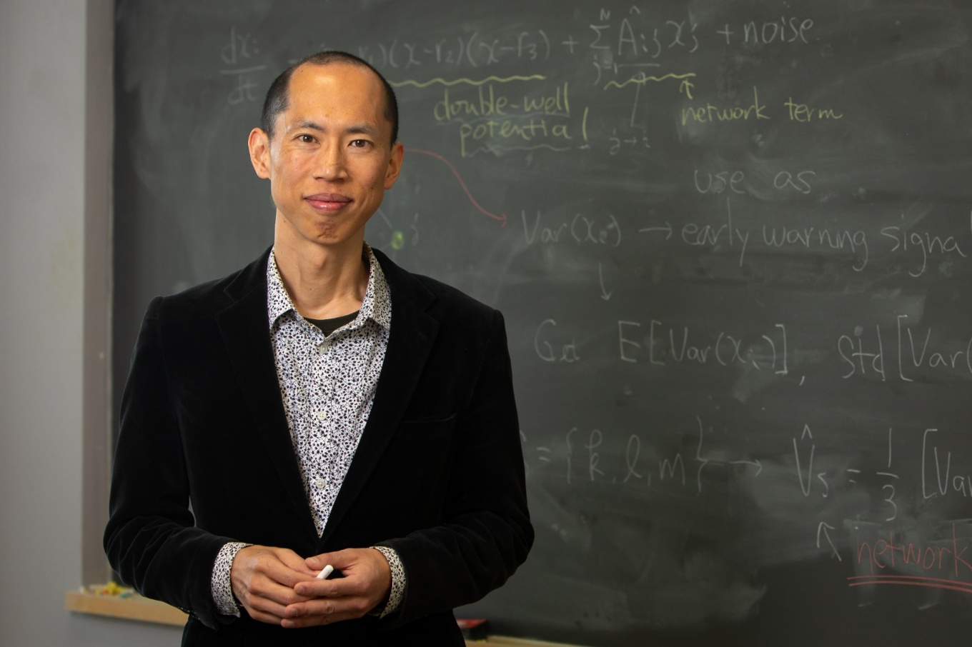 Zoom image: Naoki Masuda, professor of mathematics, is the lead author of a study that identifies the best data points for prediciting tipping points across various systems. Photo: Meredith Forrest Kulwicki/University at Buffalo 