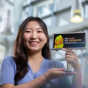 Zoom image: Haeun Lee won a billboard design competition conducted through the UB Curriculum course &ldquo;American Diversity and Design.&rdquo; Photo: Douglas Levere 