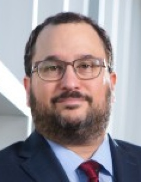 Portrait of Sociology Associate Professor, Robert M. Adelman in Alfiero Hall Photographer: Douglas Levere. 