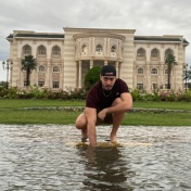 Zoom image: Jonathan Navarro-Ramos tours a flooded American University of Sharjah campus in April following unprecedented rainfall that hit the United Arab Emirates shortly after he arrived in the country. Photo: Jonathan Navarro-Ramos 