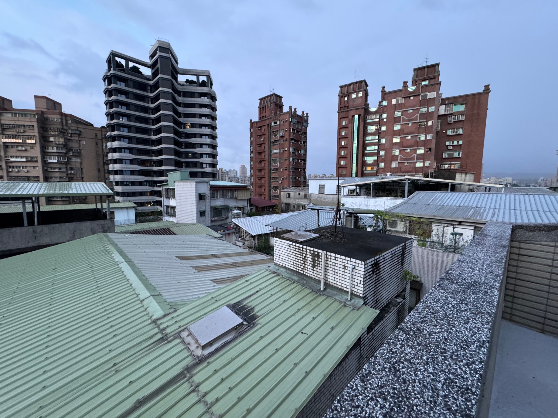 Zoom image: Part of students&rsquo; responsibilities were surveying apartment buildings in their host countries. Here, Kralles photographed the rooftop of a dwelling in the city of Taipei. Photo: Zachary Kralles 