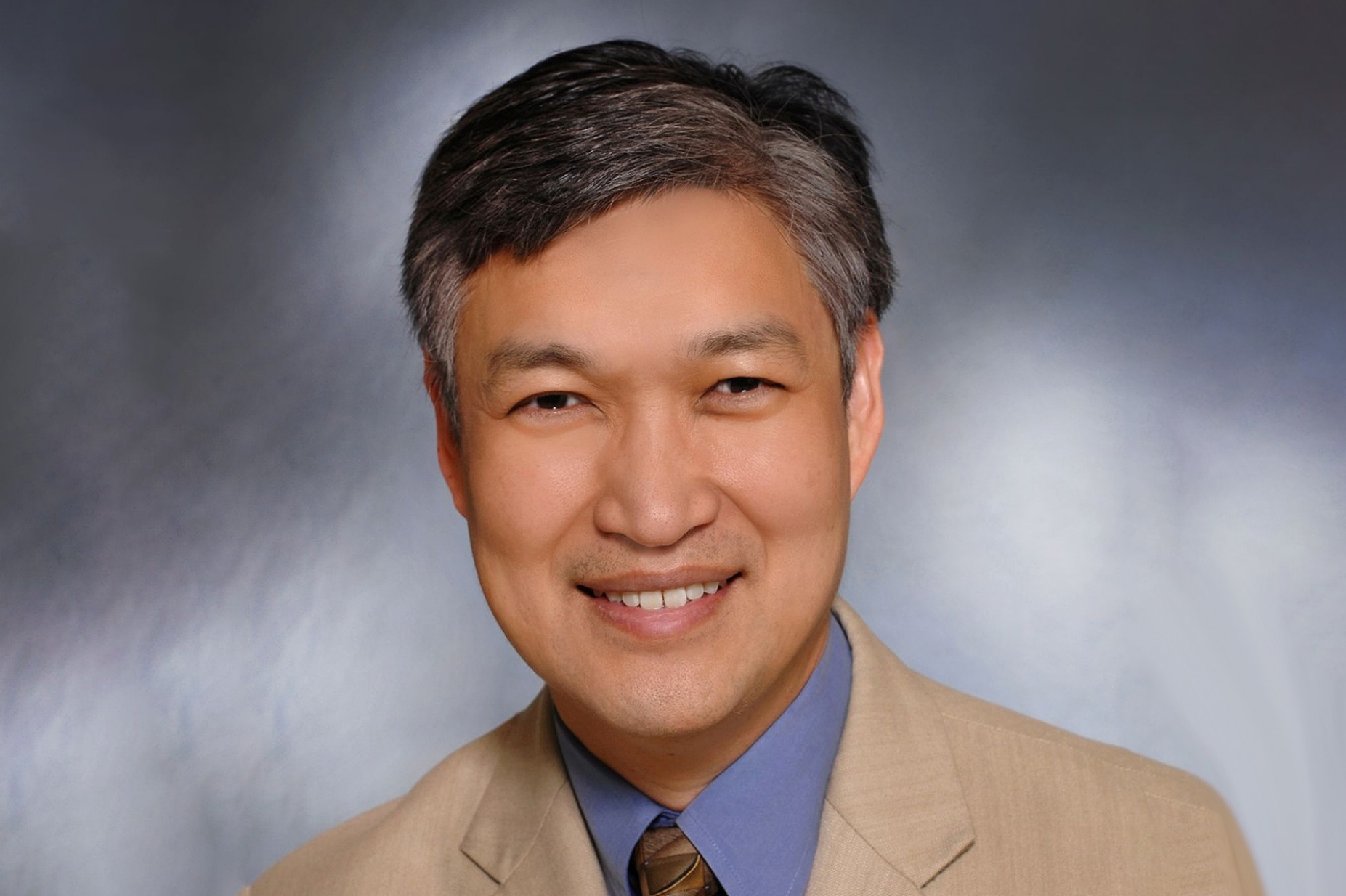 Headshot of Daniel Woo.