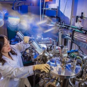 UB scientist uses a dual chamber thin film deposition system to conduct advanced semiconductor research. Credit: Douglas Levere / University at Buffalo. 