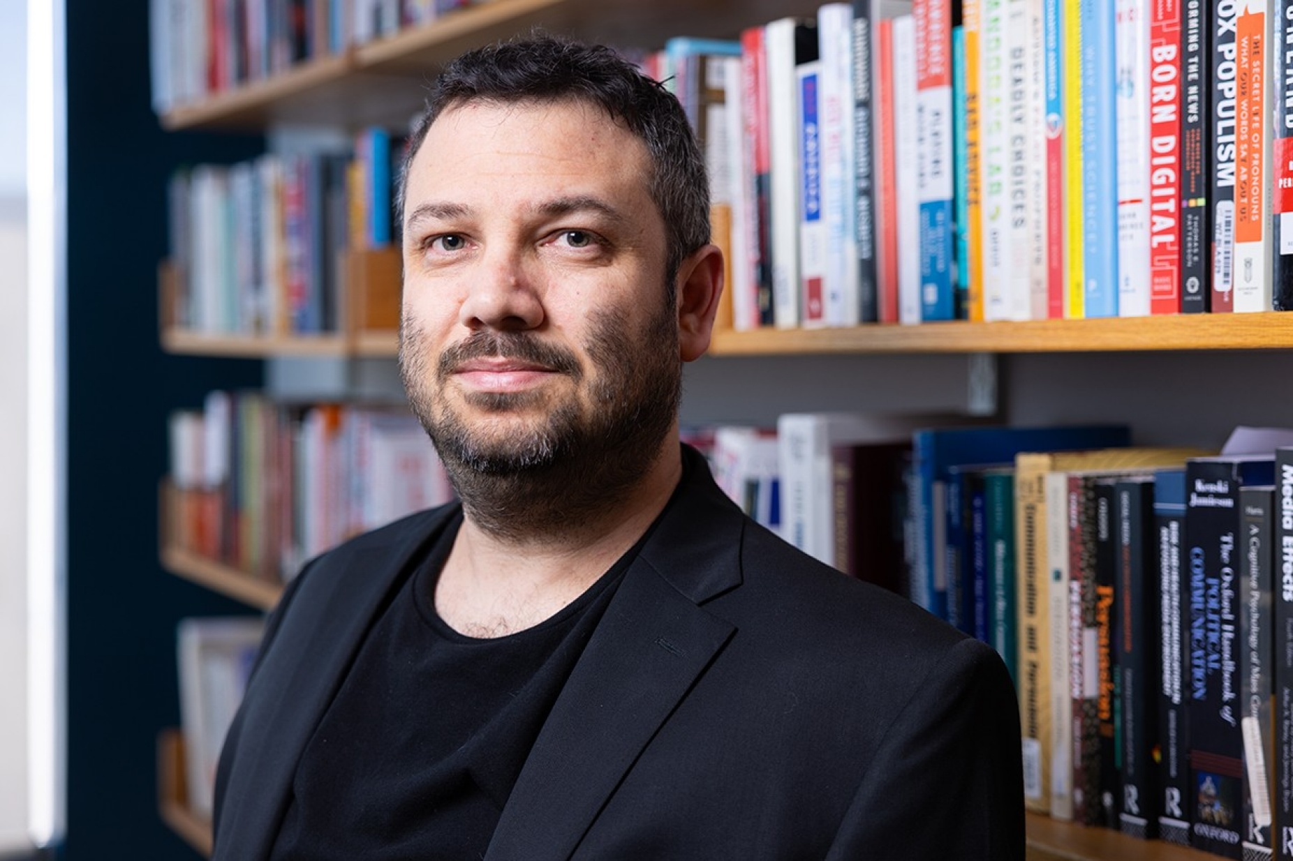 Zoom image: Science News has recognized Yotam Ophir, PhD, associate professor in UB's Department of Communication, as part of its 10 scientists to watch list. Photo: Douglas Levere 