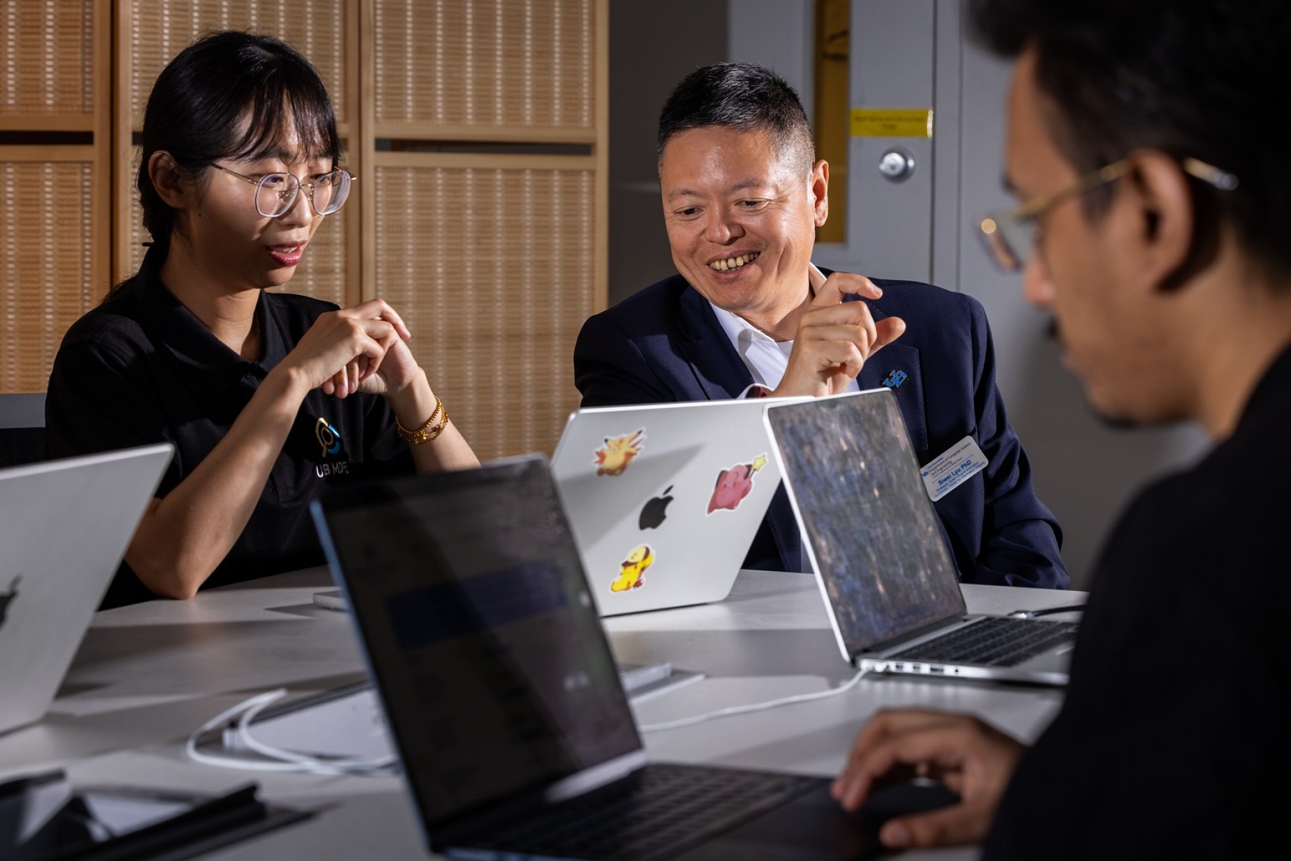 Zoom image: The DeepFake-o-Meter will also help Lyu's research team, as users can give permission for their submissions to be used to train detection algorithms. Photo: Meredith Forrest Kulwicki/University at Buffalo 