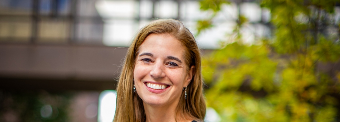 Amanda Nickerson standing outside looking at camera. 