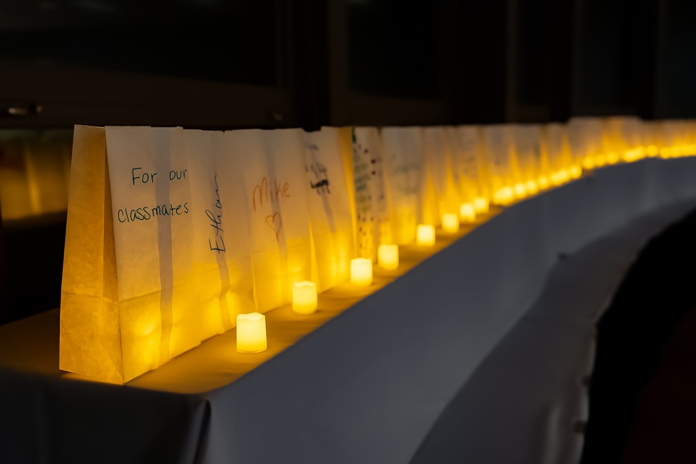 A long row of luminary lanterns. 