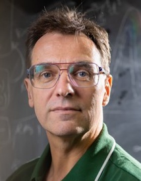 A portrait of Jochen Autschbach, with the department of chemistry, taken in August 2023 in the Natural Sciences Complex. \r\rPhotographer: Douglas Levere. 