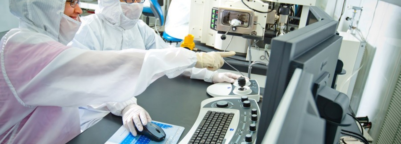 Researchers work inside the clean room at Davis Hall.