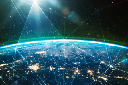 Earth seen from space with a network of lines criss-crossing the globe. 