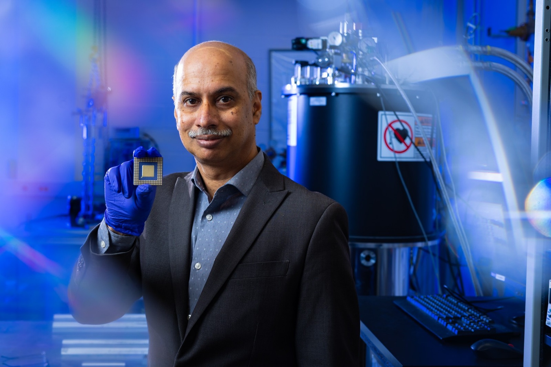 Zoom image: Sambandamurthy Ganapathy of the University at Buffalo Department of Physics leads a team developing neuromorphic computer chips, which aim to mimick the complex structure of the human brain in order to gain energy efficiency. Photo: Douglas Levere/University at Buffalo 