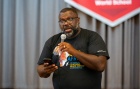 Image of LaGarrett King talking to conference attendees. 