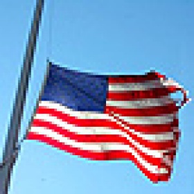 Flag at half-mast. 