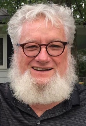 headshot of John Ellison.