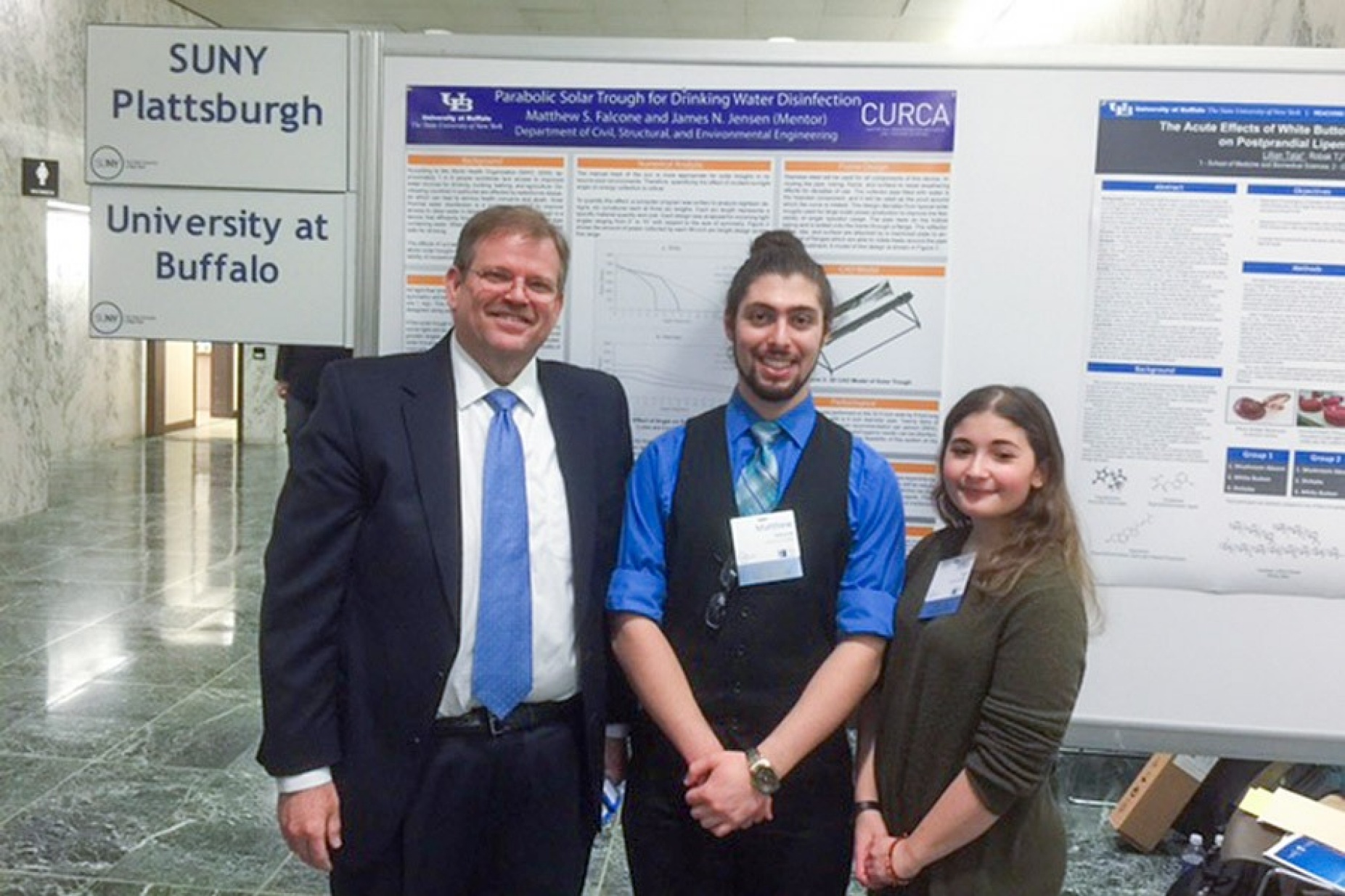 SUNY Provost Alex Cartwright and UB students Matthew Falcone and Lily Talal.