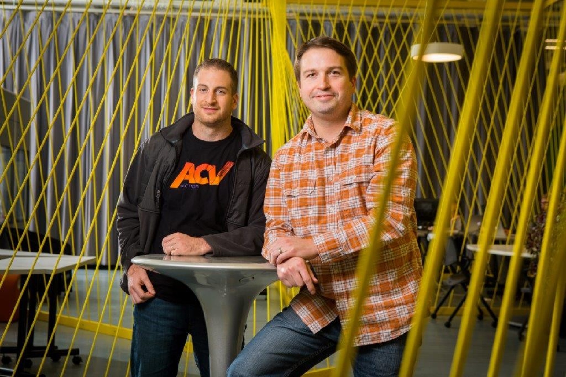 Joe Neiman and Dan Magnuszewski, co-founders of ACV Auctions, at the Thomas R. Beecher Jr. Innovation Center in Buffalo. 