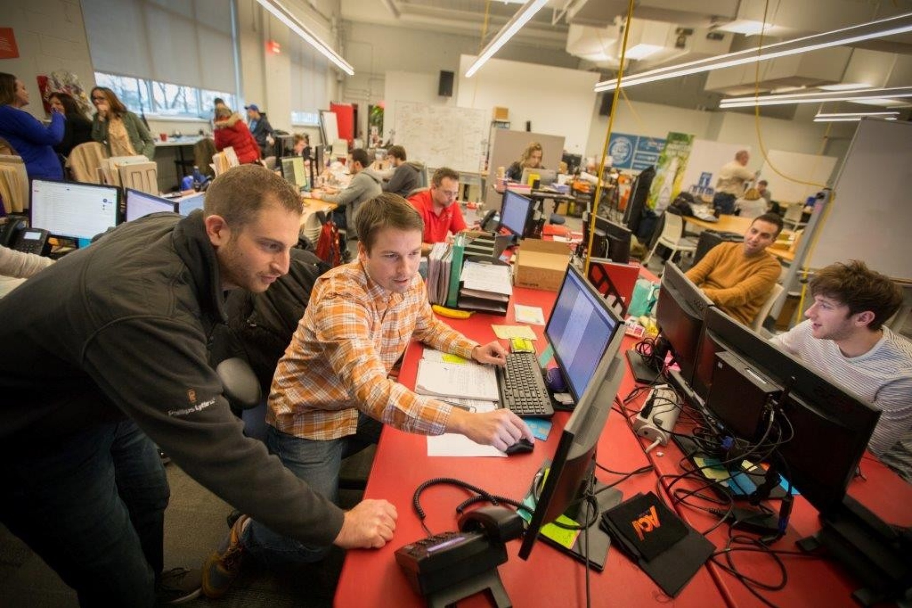 Co-founders Joe Neiman and Dan Magnuszewski in ACV Auctions' work space. 