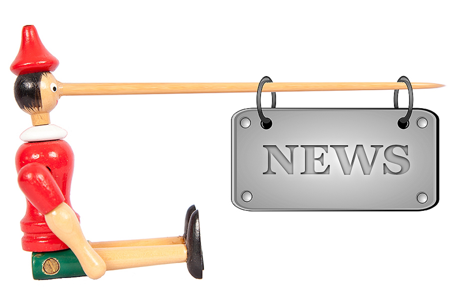 Photo illustration depicting fake news featuring a pinocchio puppet with a "news" sign hanging from its nose. 