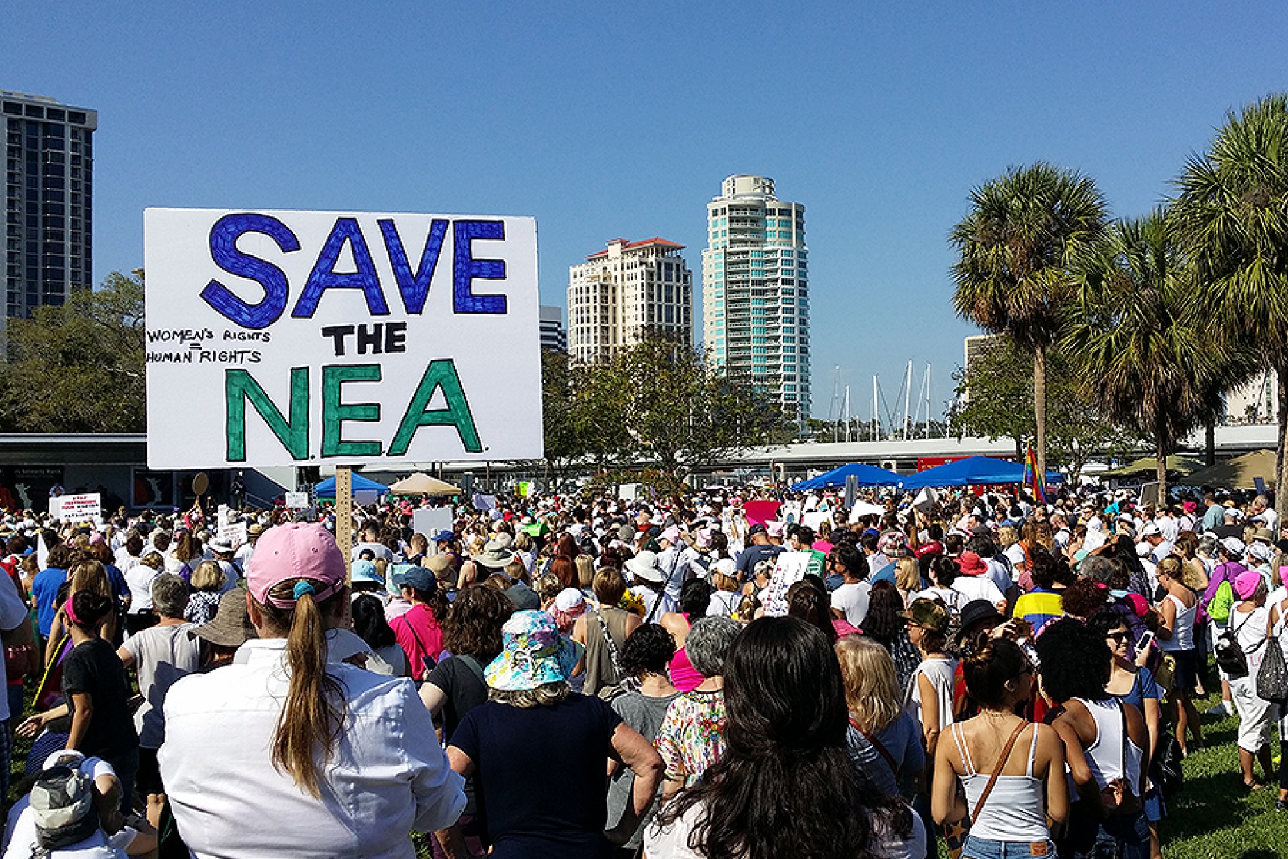Scene from Women's March in St. Petersburg, Fla. Features sign that says Save the NEA. 