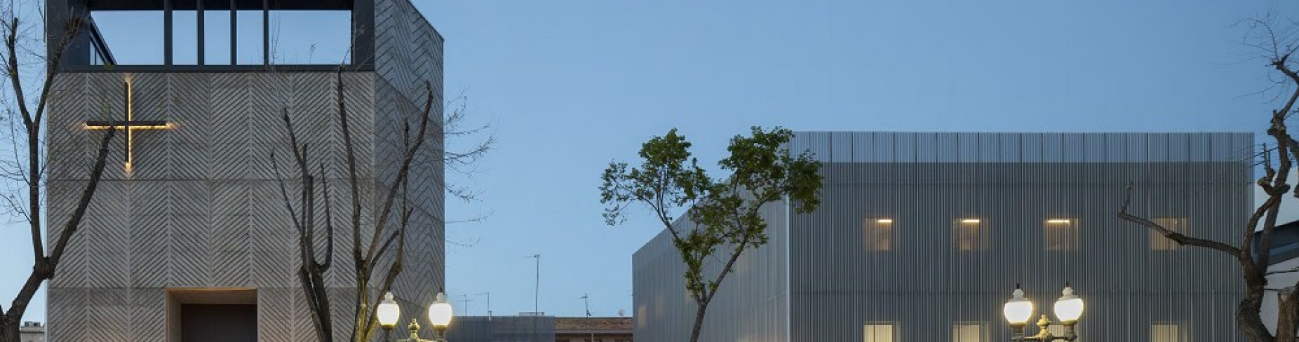 Zoom image: Miguel Guitart&rsquo;s award-winning project consists of three buildings with a total construction of 30,000 square feet. The rectory and the Parish Center, together forming an L-shape, hold the city fabric behind it and frame and accentuate the church itself. 