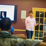 Jeff Polish speaking to students at Hadley Village Community Room. 