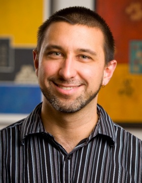portrait of Michael Poulin in his office. 