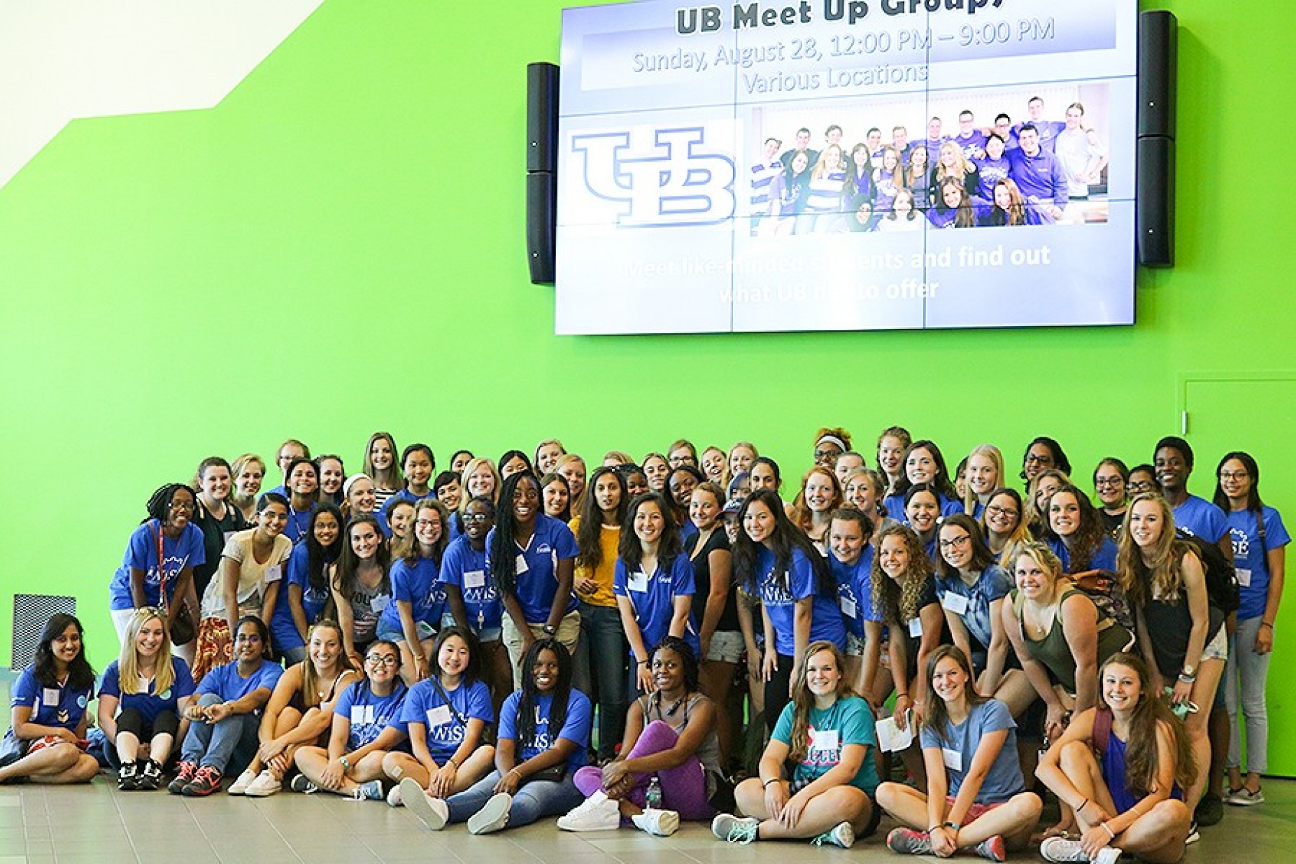 Group photo, taken in the Student Union, of the women involved in the WiSE program at UB. 