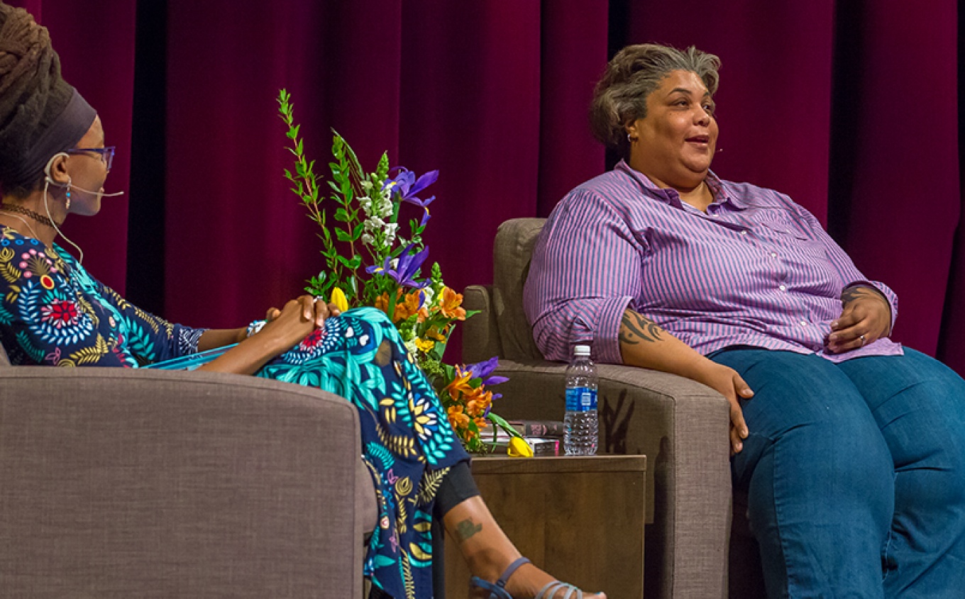 Roxane Gay and Nnedi Okorafor seated on the stage in the Center for the Arts Mainstage. 