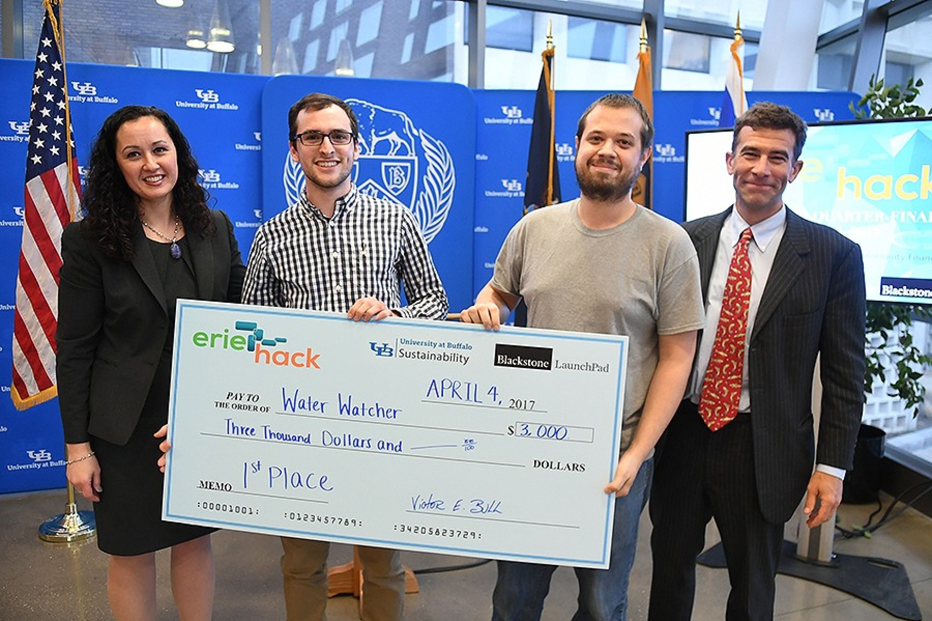 First-place team with their "check". 