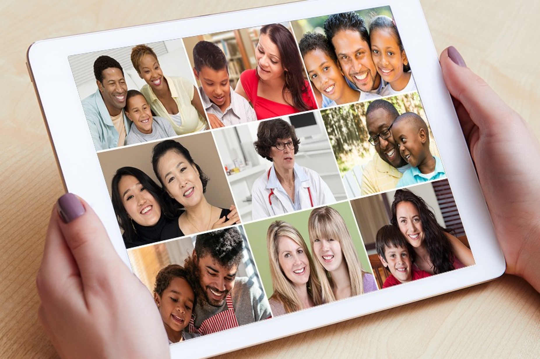 conceptual photo of a doctor teleconferencing with several families on an ipod. 