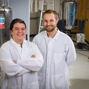 photo of presidential fellow Corey Damon and Schomburg Fellow Anibal Davalos. 