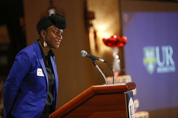 Aisha O'Mally speaks during the 200 Hearts Celebration. 