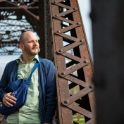 Portrait of Dennis Reed on the train bridge in North Tonawanda. 