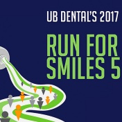 Graphic for Run for Smiles 5k race -- tube of toothpaste squeezing out into a road with runners on it. 
