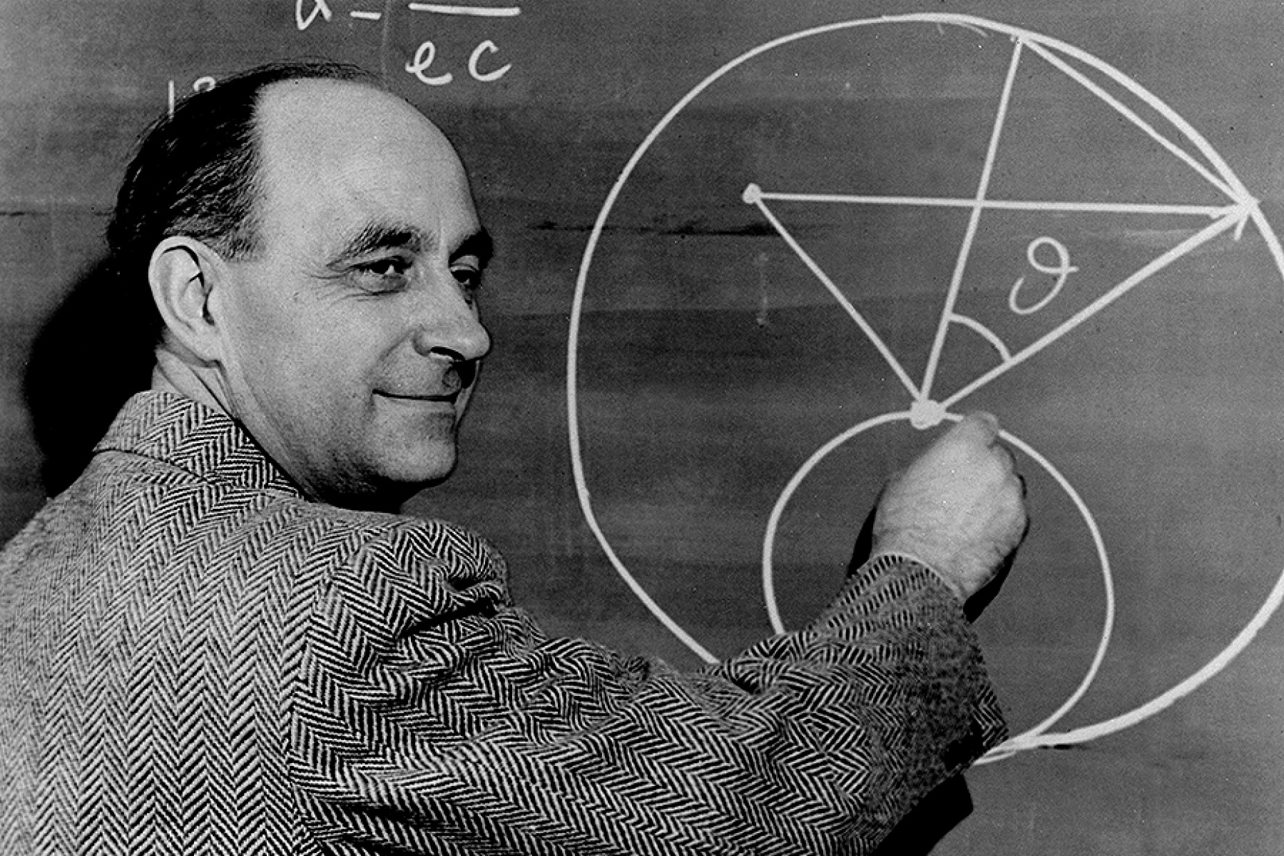 Photo of Enrico Fermi at the blackboard. 