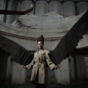 photo of Nnedi Okorafor with huge wings. 