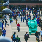 Students walking along Founders Plaza. 