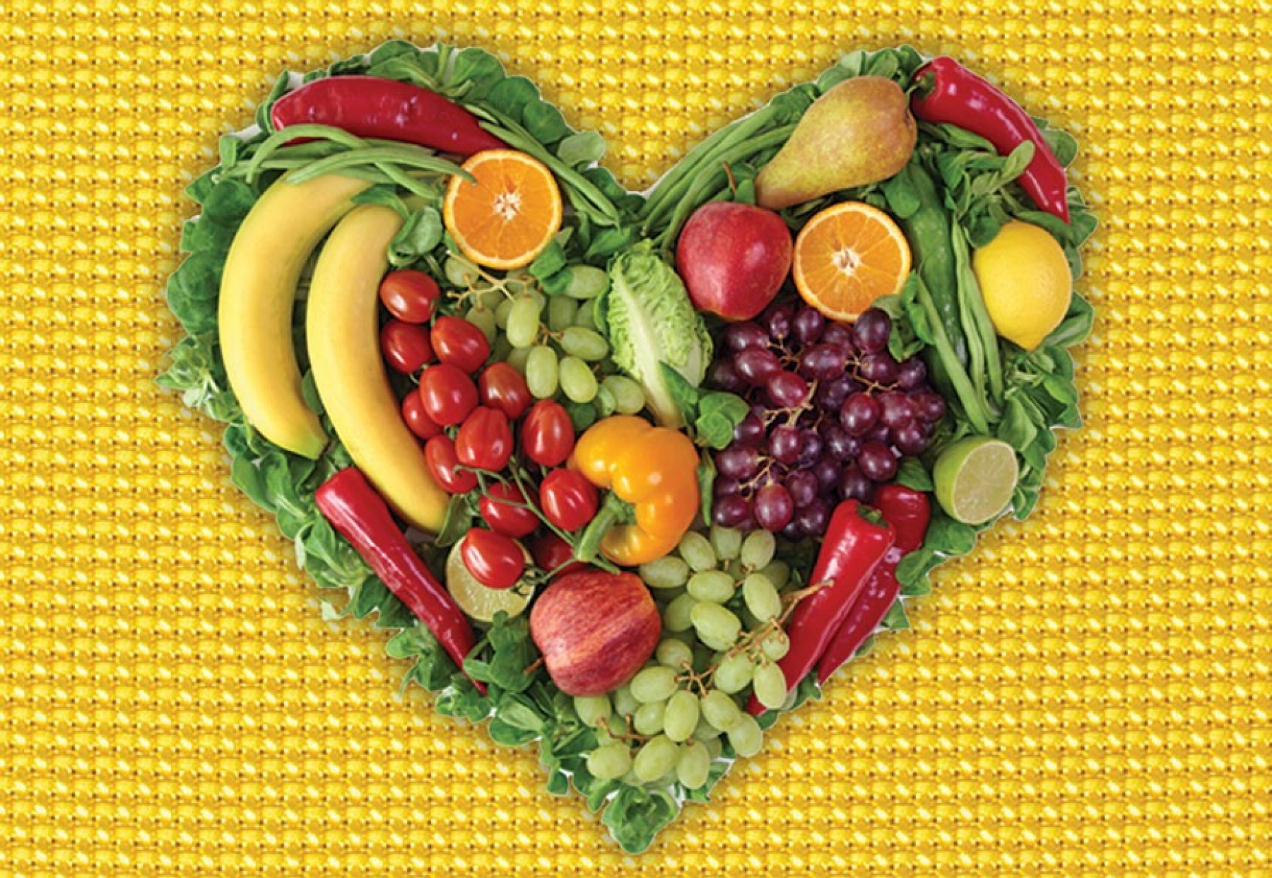 graphic of a heart filled with fruits and vegetables. 