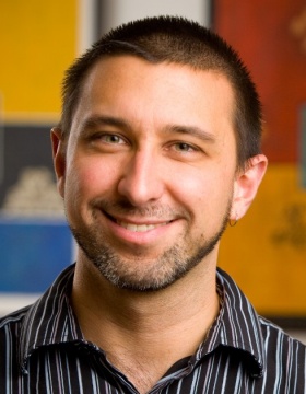 headshot of Michael Poulin. 