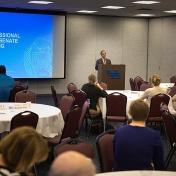 President Tripathi discusses the Excelsior Scholarship during the Profession Staff Senate meeting. 