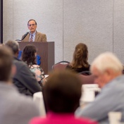 President Tripathi addresses the voting faculty. 