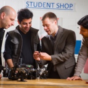 UB faculty working with robotics. 