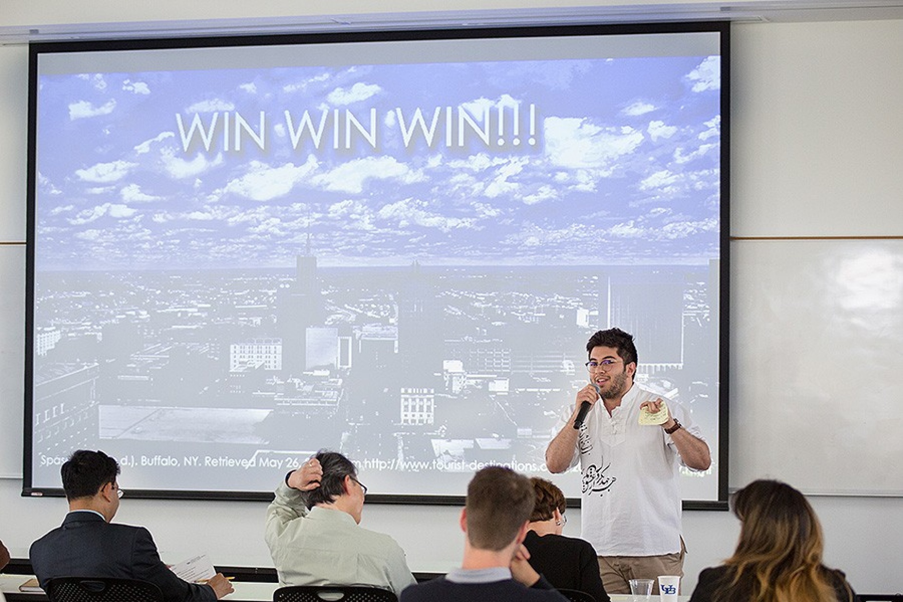 "The Undividables" team member, Arsalan Haghdel, presents the team's idea. 