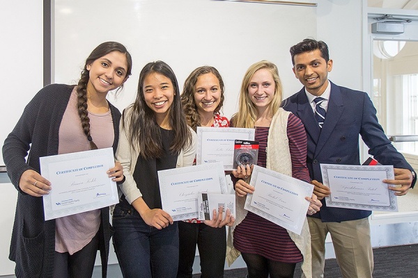 Zoom image: &quot;The Bridge&quot; team (from left): Bianca Kohli, Chrys Terrado, Kellie Schmit, Rachel Daws and Dipesh Patel. Photo: Meredith Forrest Kulwicki 